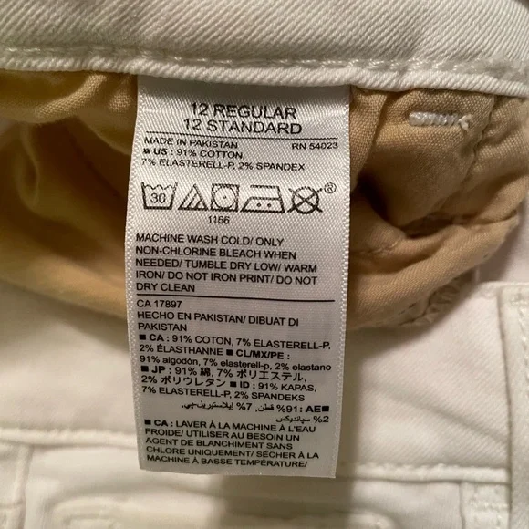 Old Navy Rockstar Mid-Rise White Distressed Skinny Jeans Size 12 - Picture 4 of 12